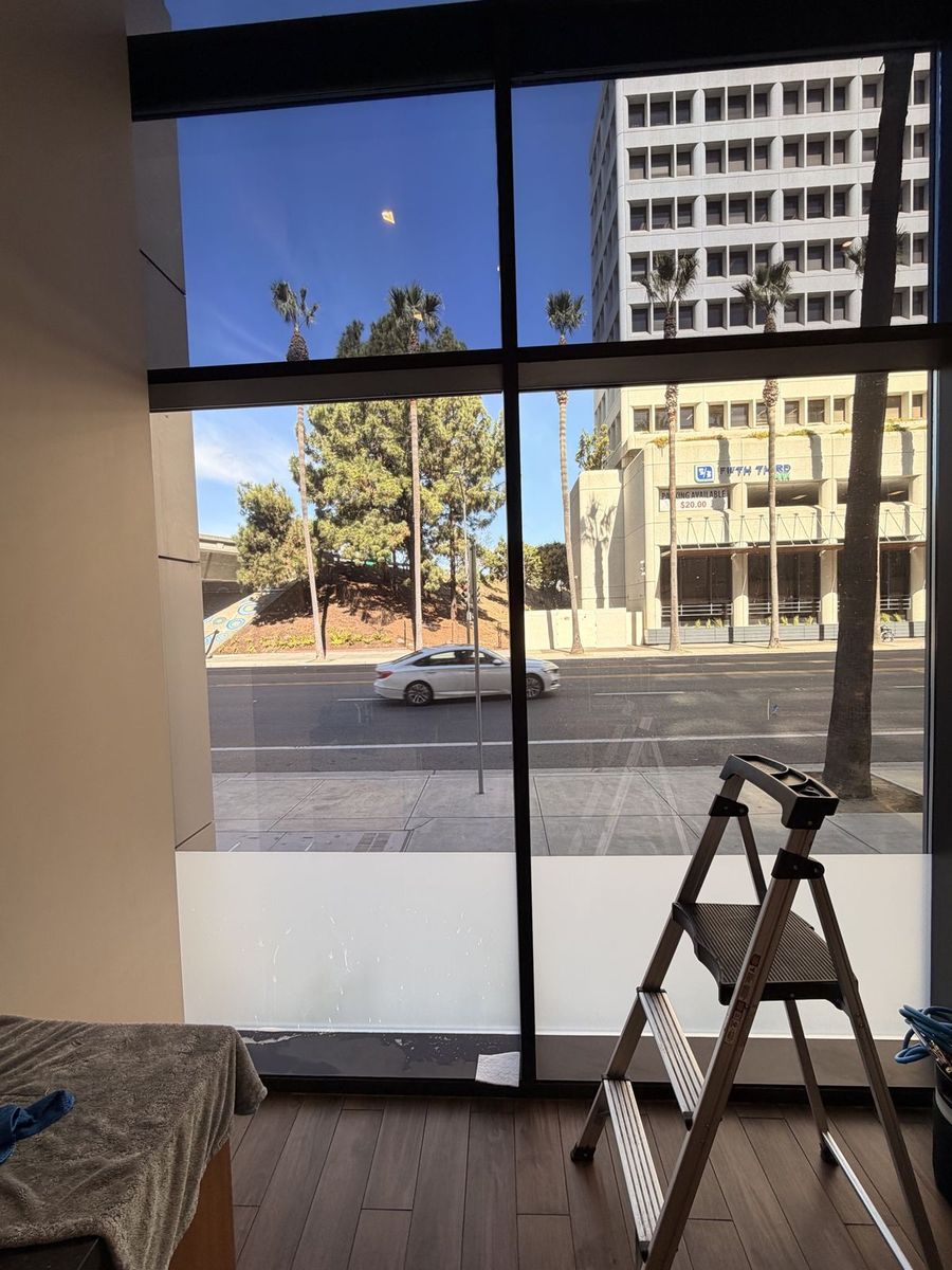 Frosted privacy band with tinted upper glass in a San Jose office